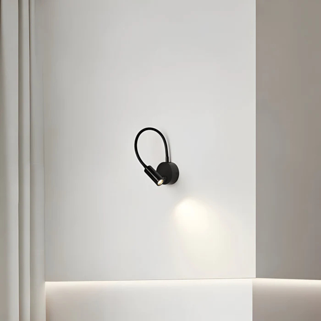 Lumio - Flexible black indoor LED wall lamp